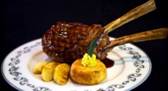 Christini’s Ristorante Italiano signature dishes Spaghetti alla Christini (with clams and shrimp)Veal Chop with SageBranzino al Sale (Salt-crusted sea bass)Osso Buco